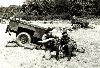 Tony with British soldier holding a British SLR at the TA/SP exercise